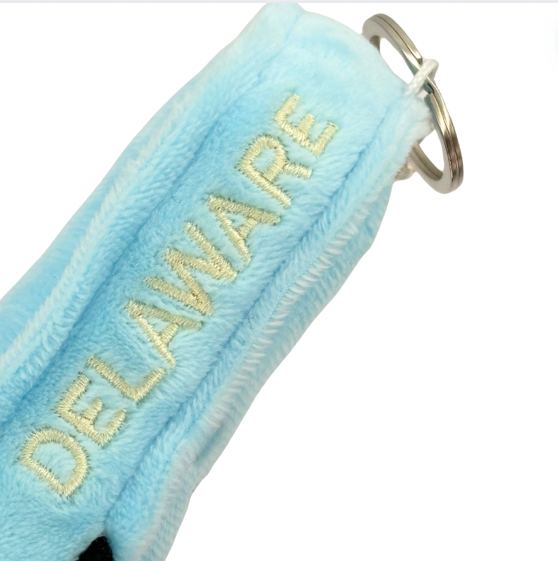 4-inch Delaware-shaped plush bag charm mini, perfect for backpacks and keyrings with detailed stitching