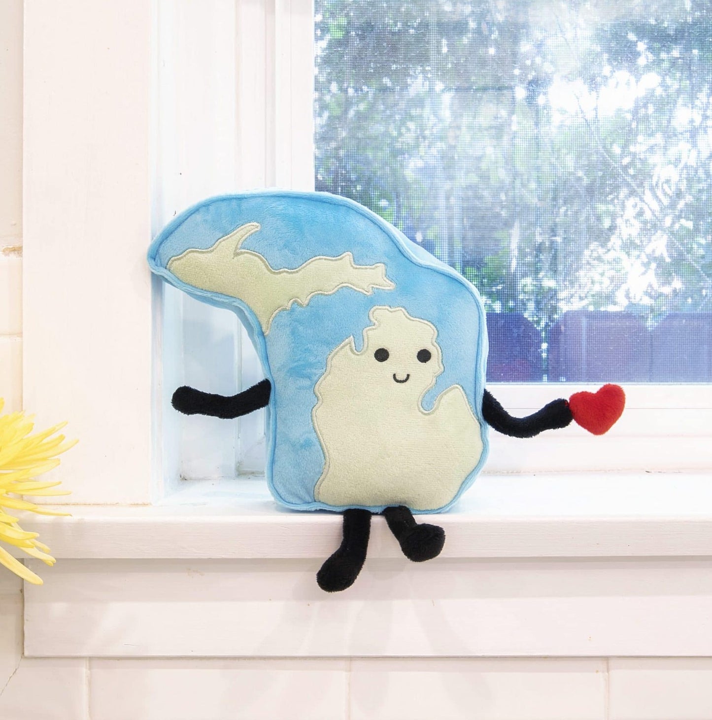 Michigan-shaped stuffed state plush, perfect for collectors and educational use with detailed stitching and soft materials.